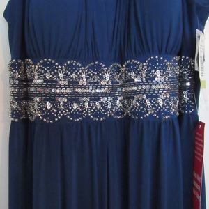 Peacock colored floor length dress
